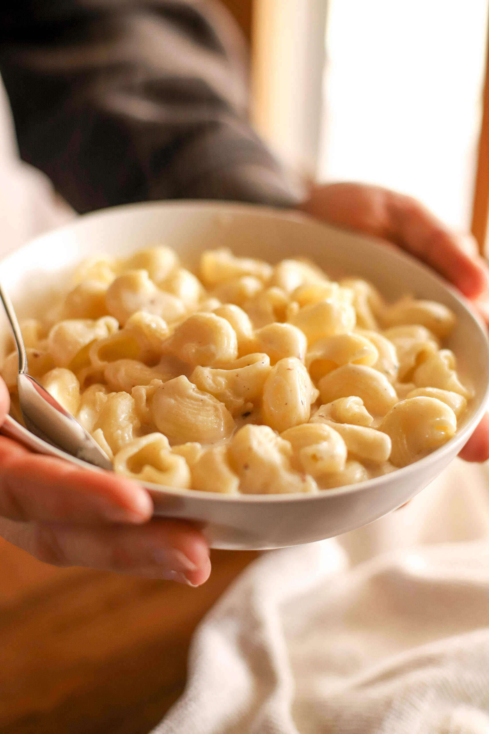 a serving bowl with macaroni and cheese