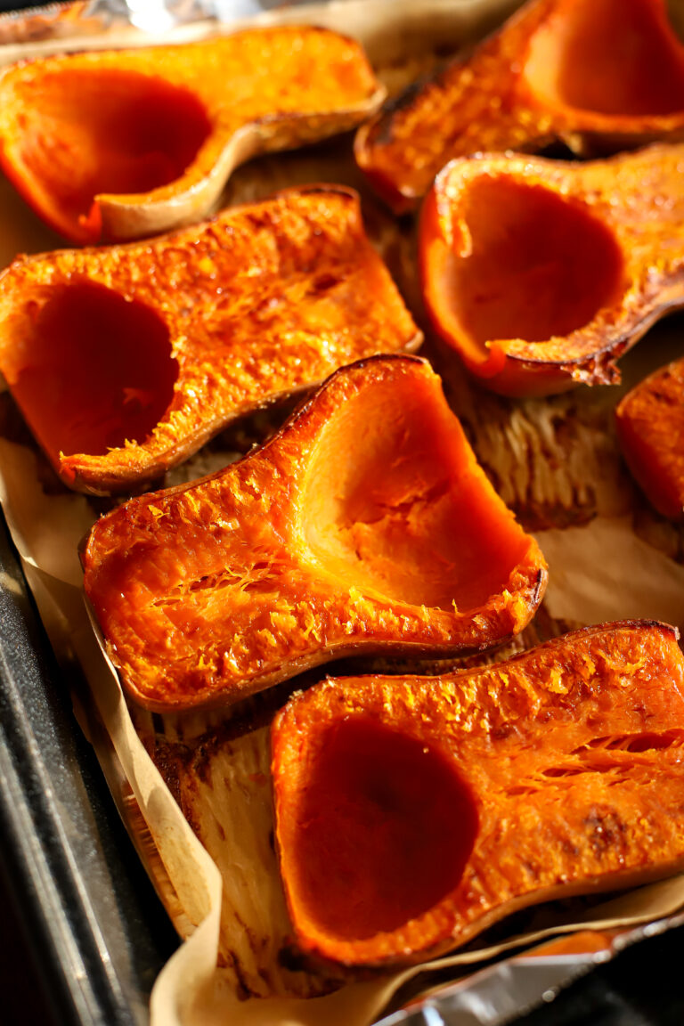sheet pan of halved butternut squash