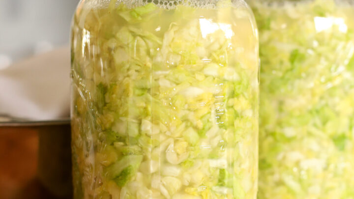 half gallon jar full of sauerkraut