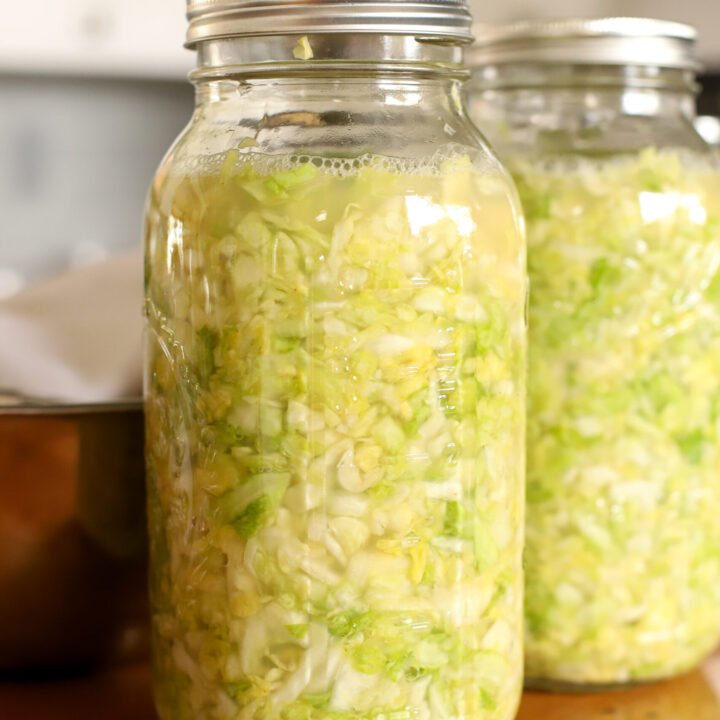 half gallon jar full of sauerkraut