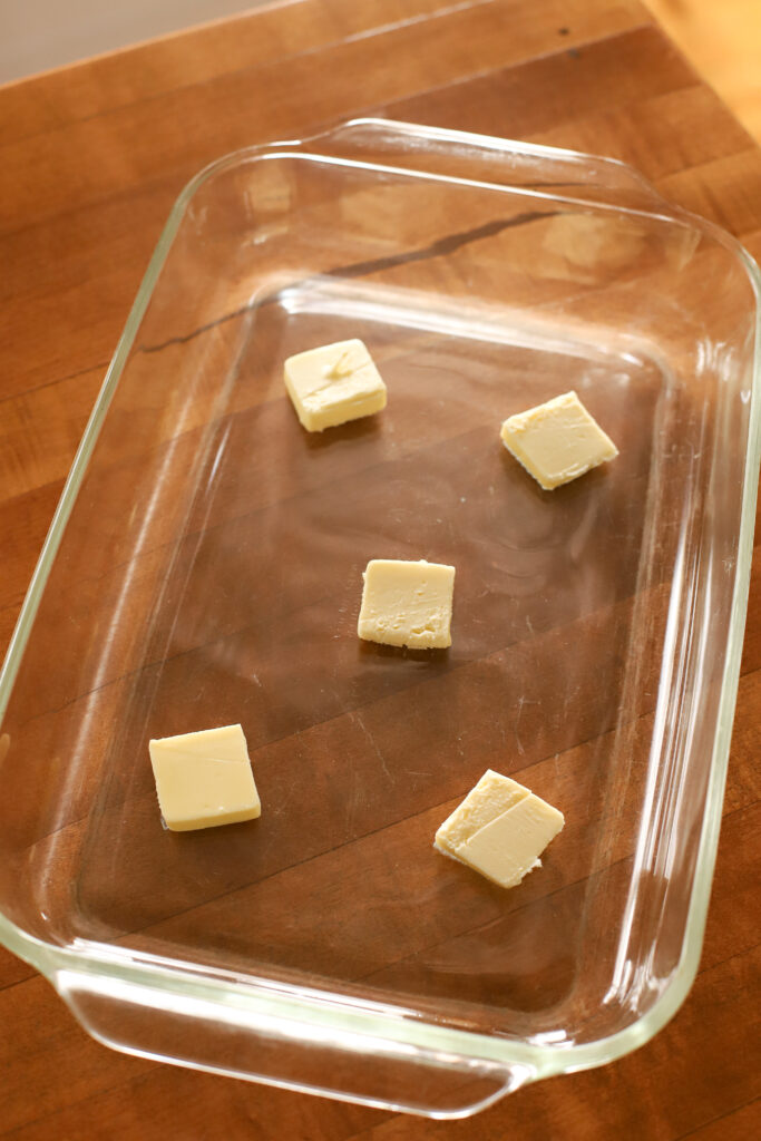 Butter in a 9x13 pan