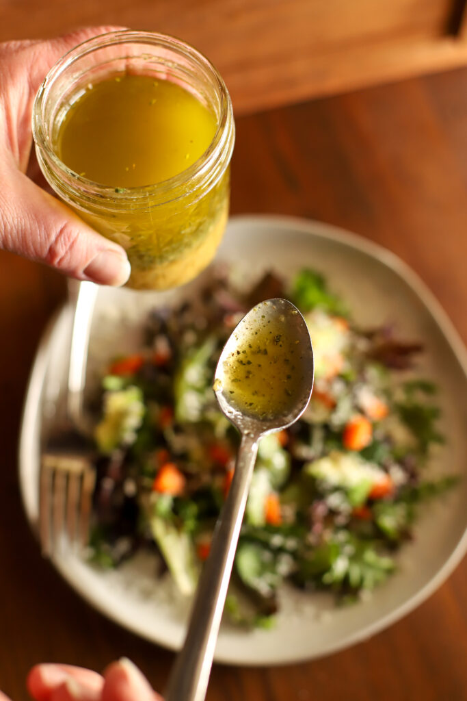 close up image of a spoonful of vinaigrette