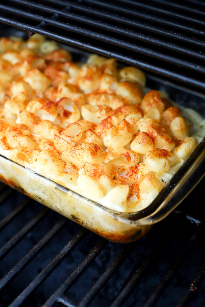 up close shot of macaroni and cheese in the smoker