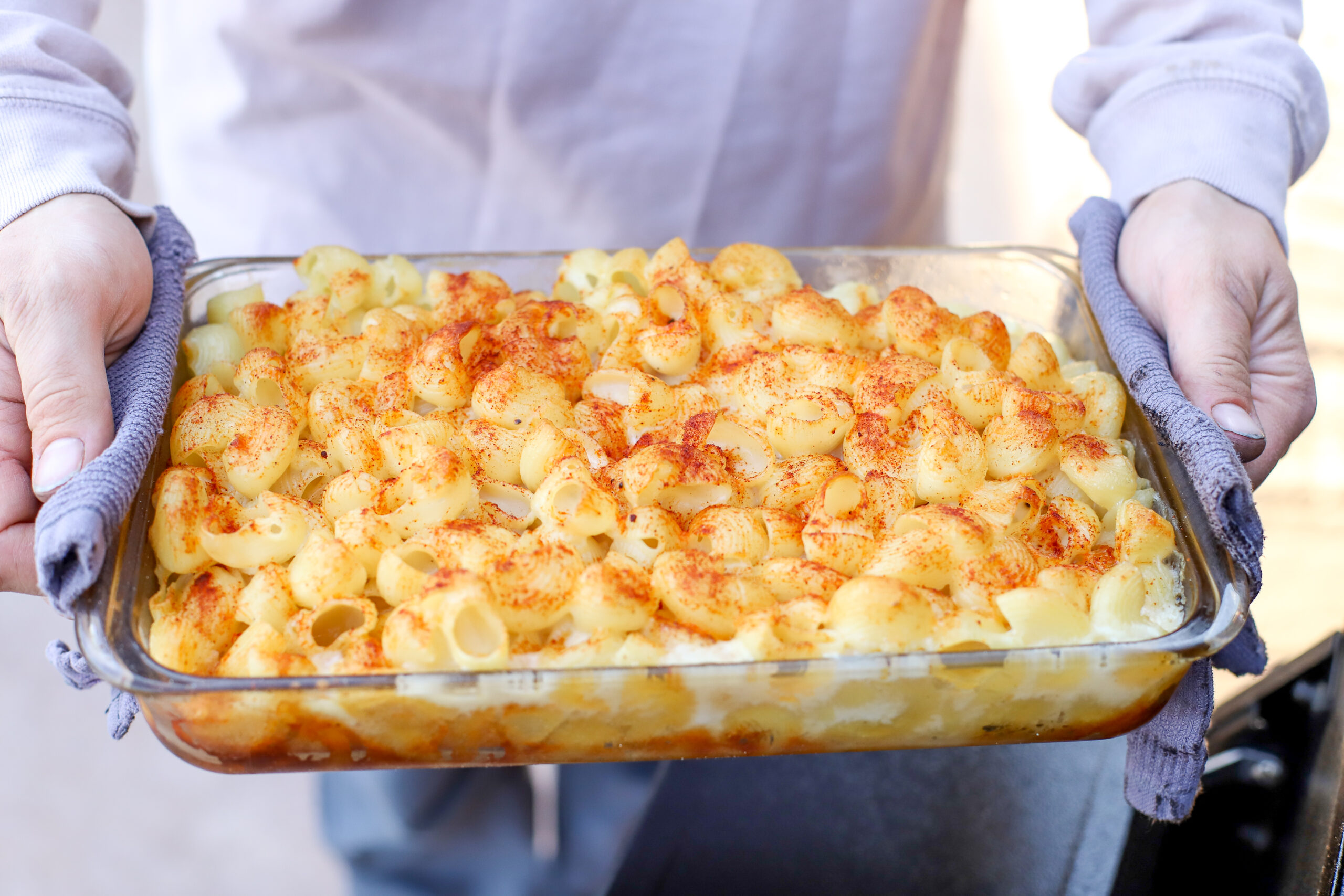 smoked mac and cheese in glass pan