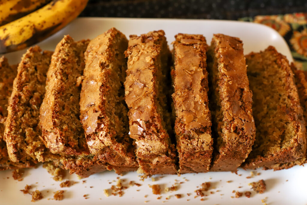 plate of sliced freshly milled banana bread