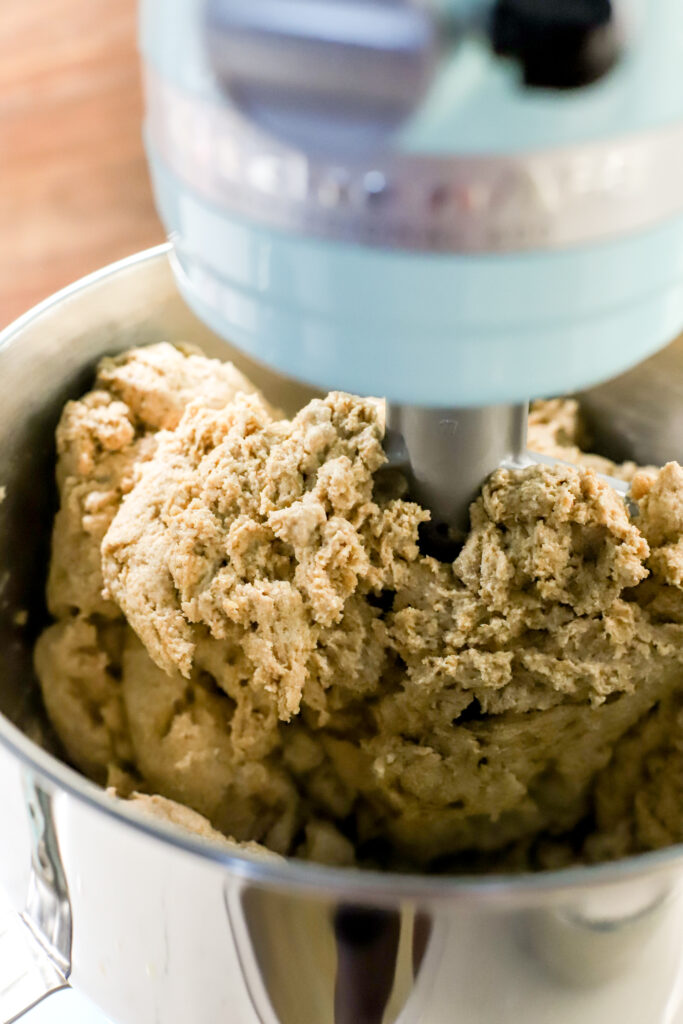 up close shot of sourdough sandwich bread in mixer