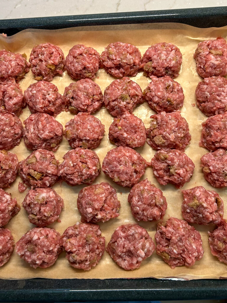 Italian Pork Meatballs on baking sheet