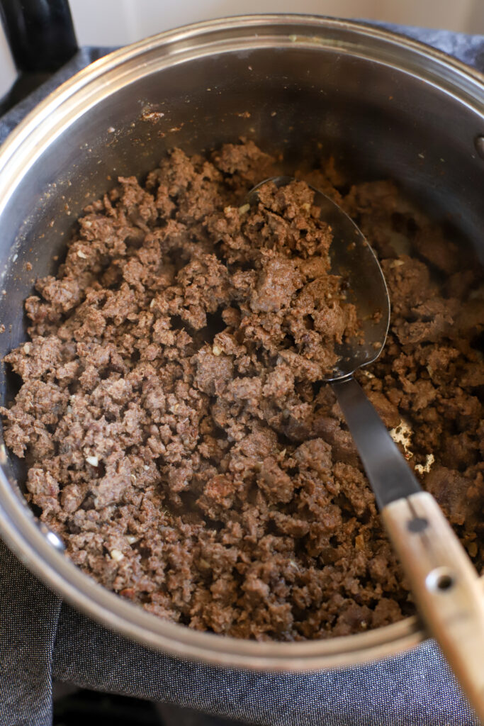 a pan of cooked hamburger