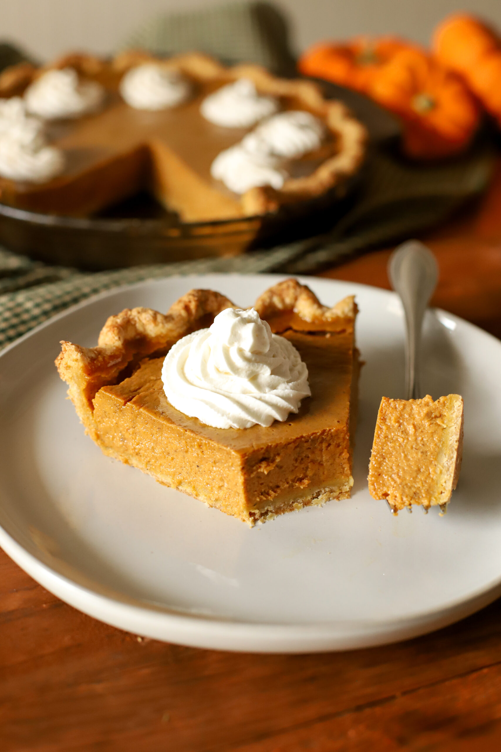 slice of pumpkin pie on a plate