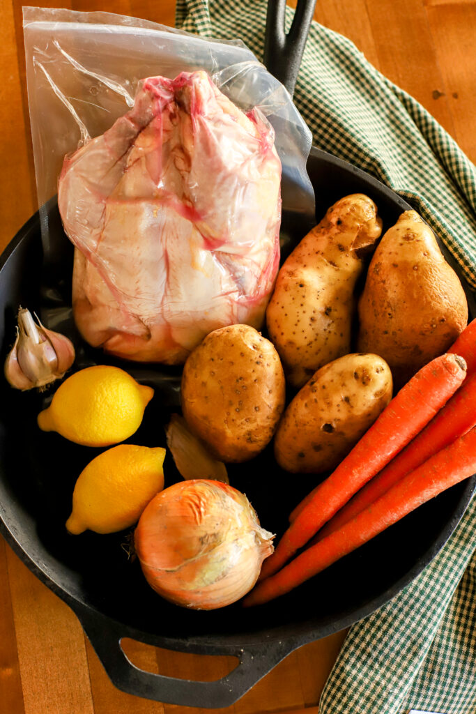 ingredients for roasted whole chicken and vegetables