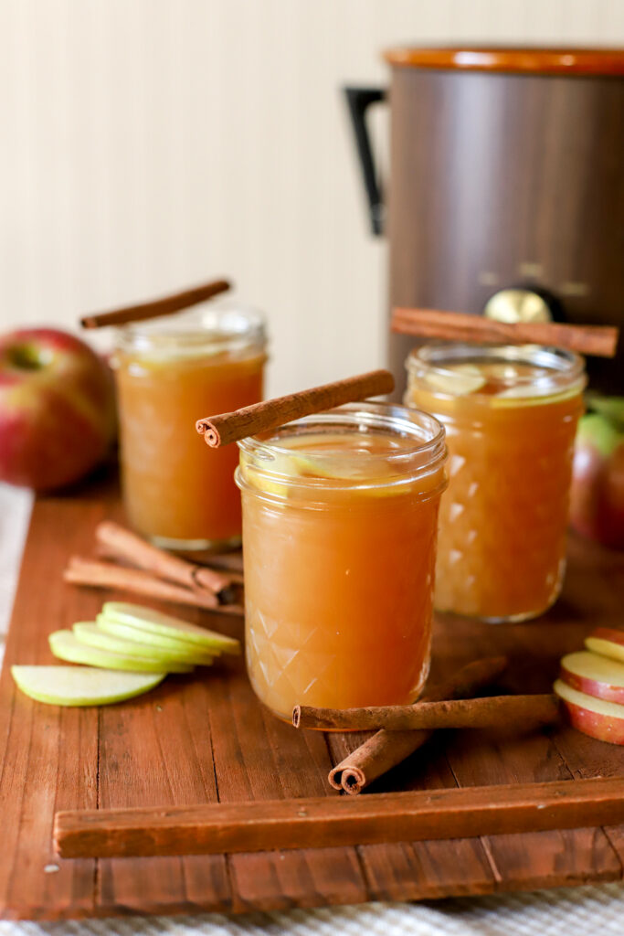 up close shot of several glasses of fresh apple cider