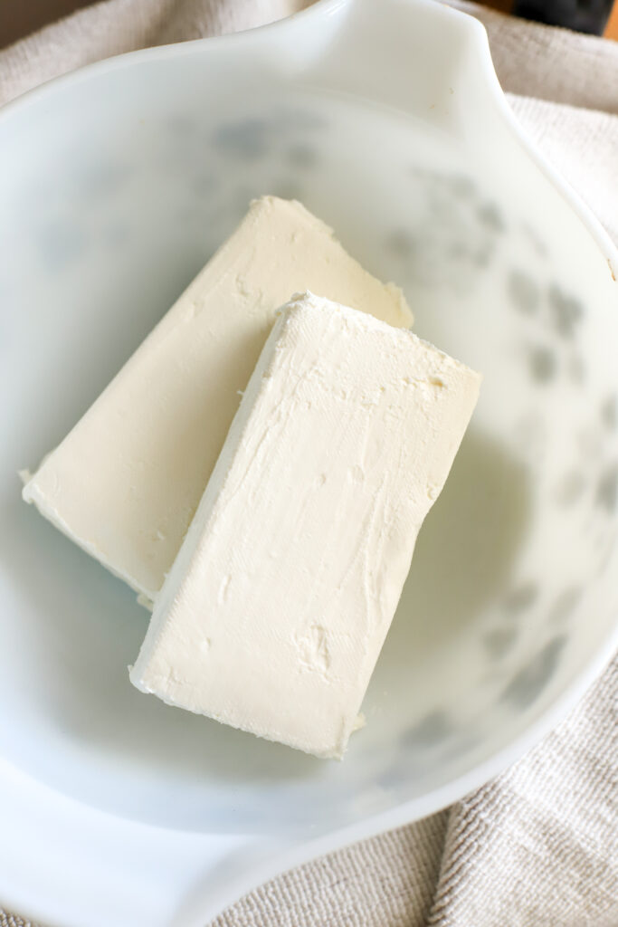 bowl of softening cream cheese
