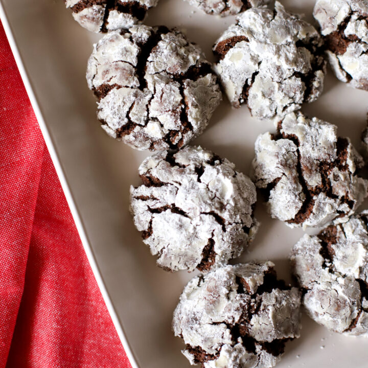 up close shot of fresh milled crinkle cookies on a tray