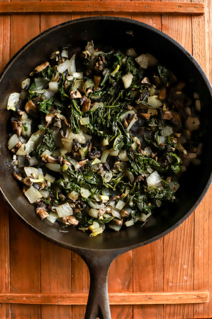 up close shot of cooked vegetables in a skillet