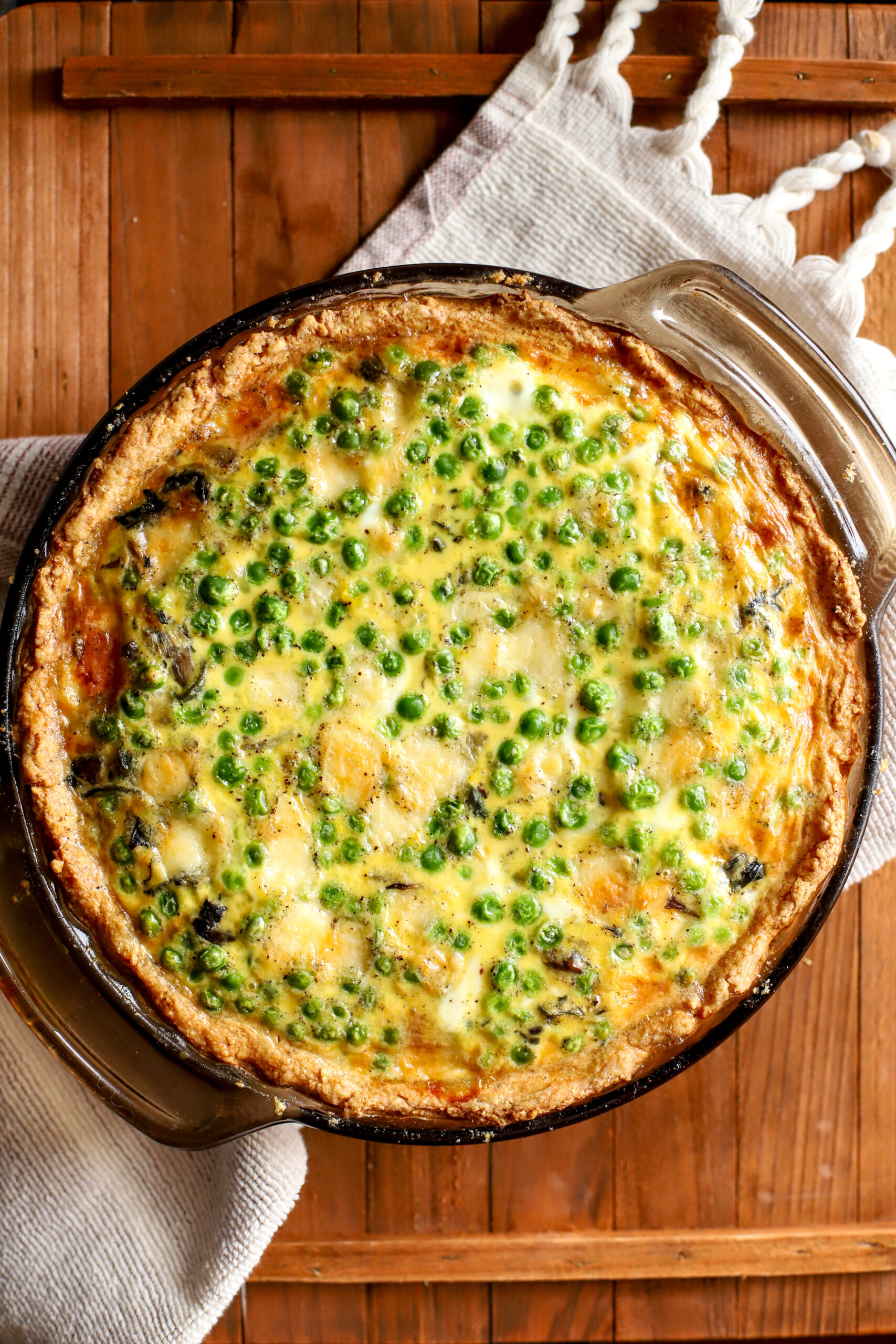 up close shot of vegetable quiche with fresh milled pie crust