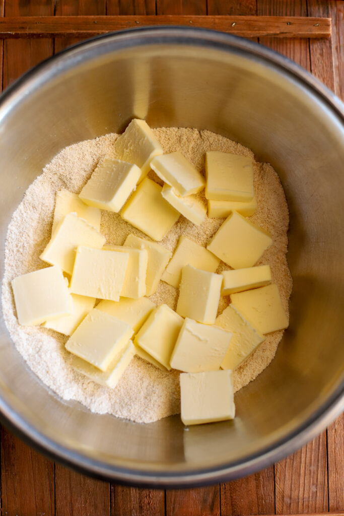 up close shot of cubed butter and flour in a bowl