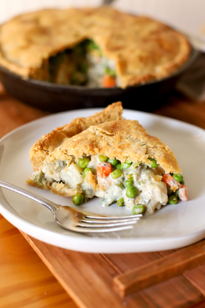 up close shot of slice of chicken pot pie with fresh milled flour crust