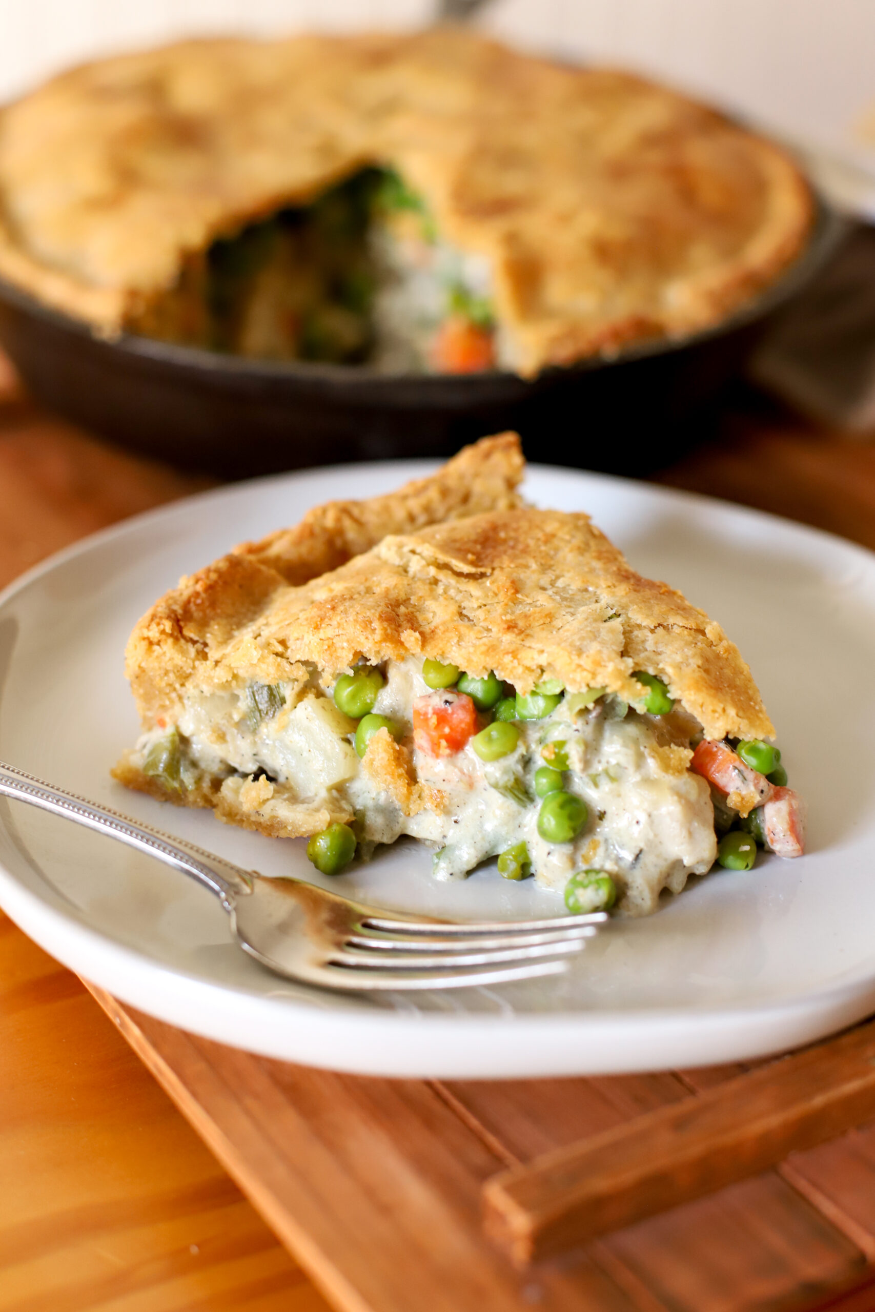 up close shot of slice of chicken pot pie with fresh milled flour crust