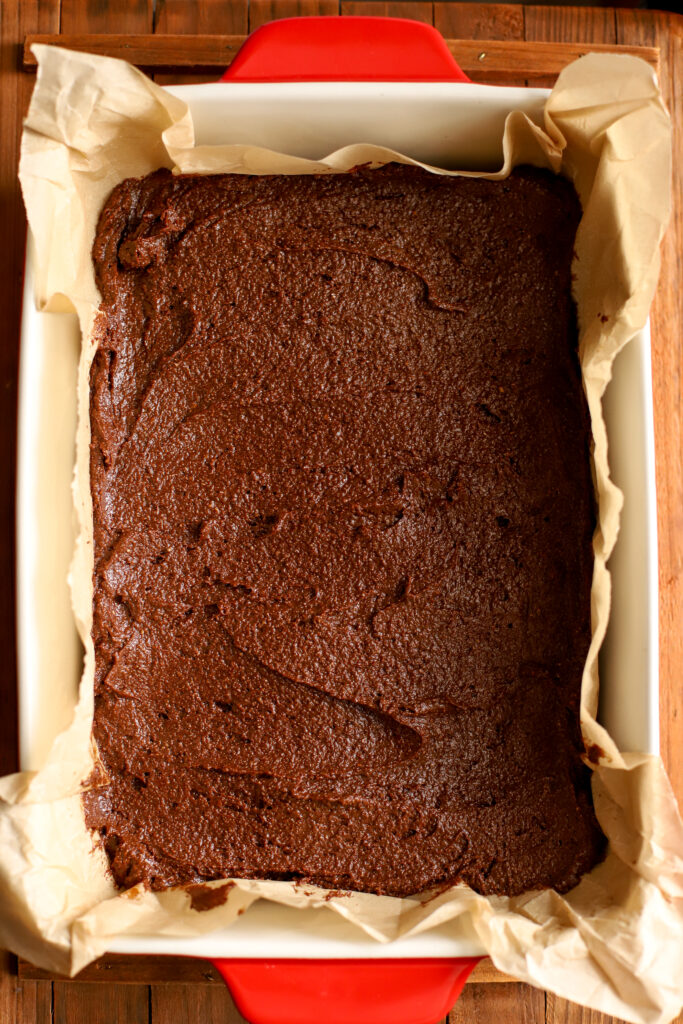 up close shot of unbaked fresh milled brownies in a pan