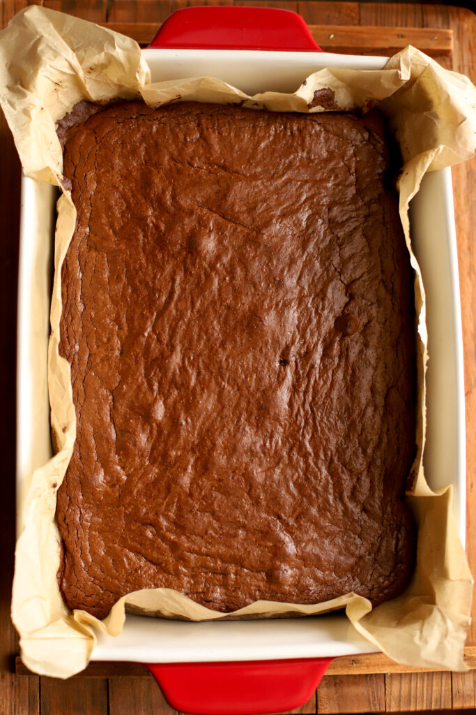 up close shot of baked fresh milled brownies in a pan