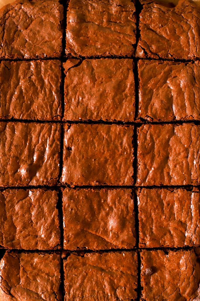 up close shot of sliced fresh milled fudgy brownies