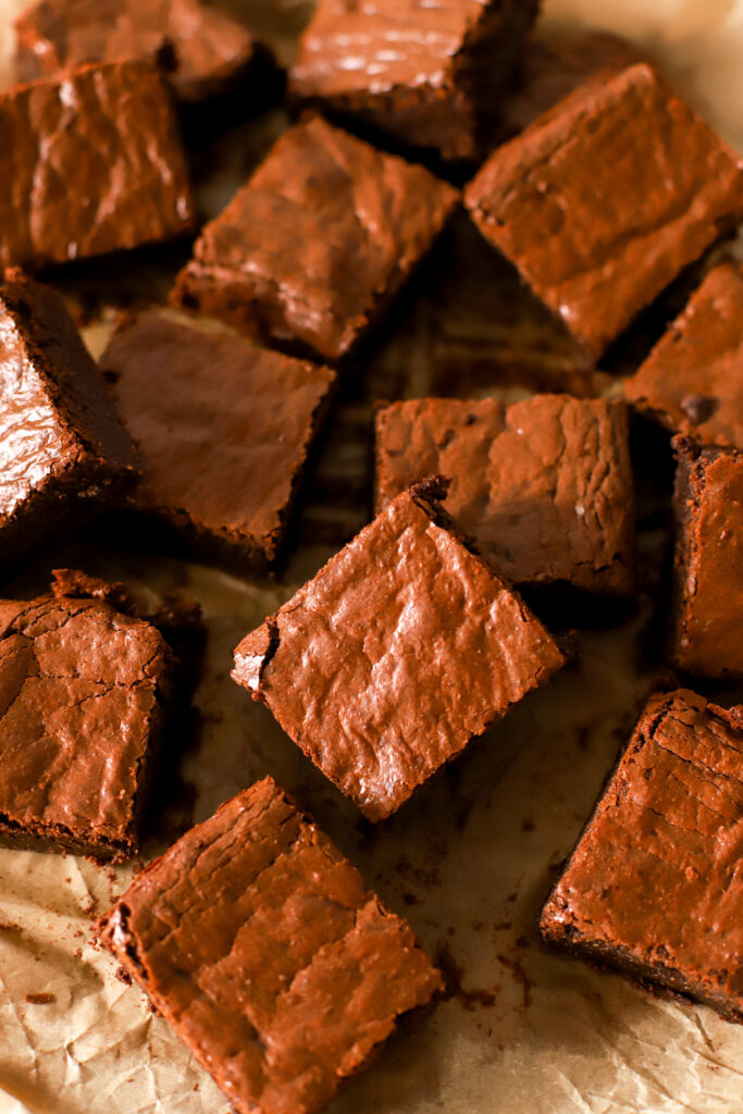 up close shot of sliced fresh milled fudgy brownies