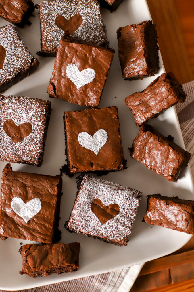 up close shot of fresh milled fudgy brownies on a plate