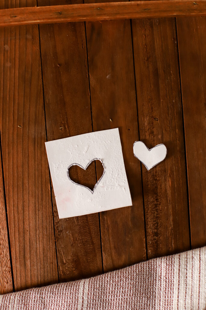 stencils used to make powdered sugar designs on brownies