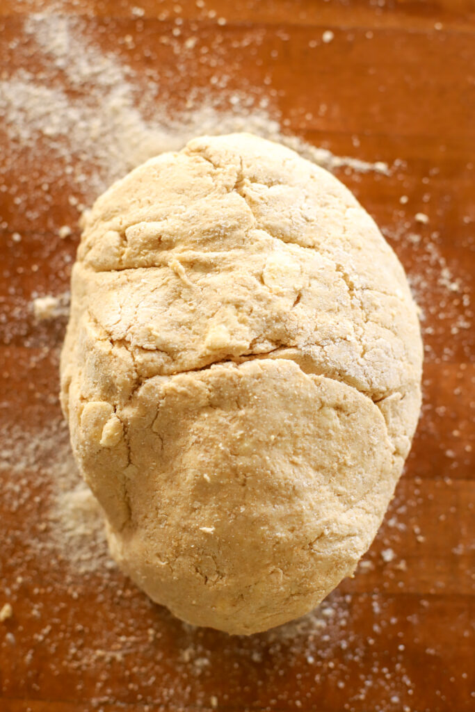 up close shot of fresh milled biscuit dough ready to be rolled out