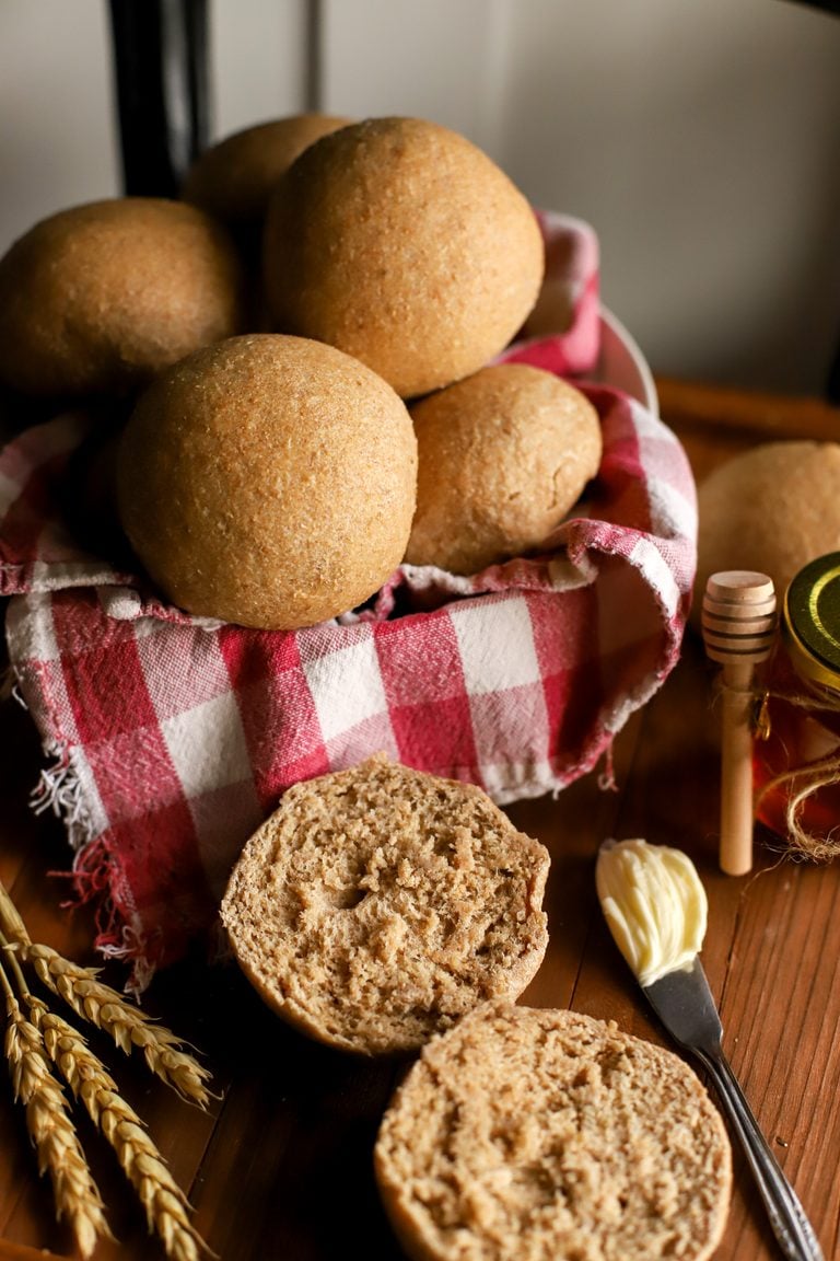 up close shot of bowl full of fresh milled sourdough dinner rolls