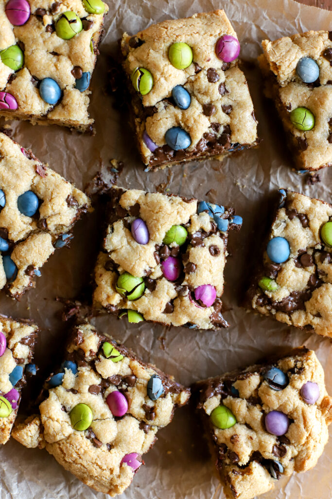 up close shot of sliced fresh milled cookie bars on a piece of parchment paper
