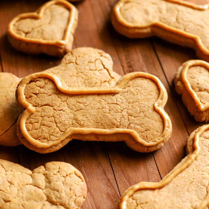 up close shot of a wooden tray full of homemade dog treats